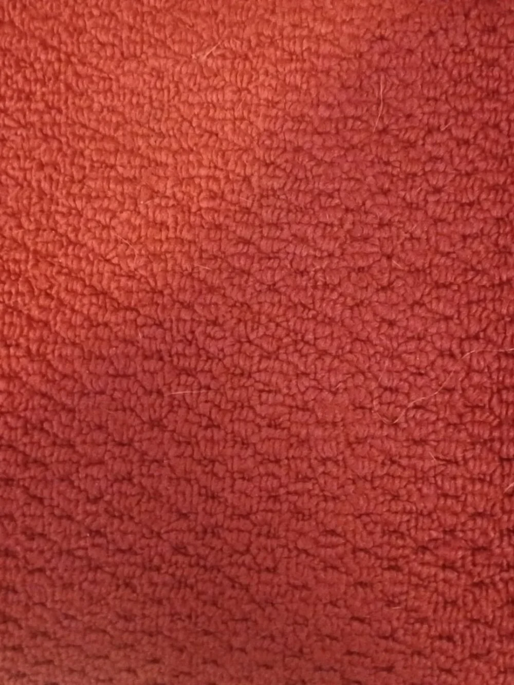 The wine colored hallway runner is a stylish addition to any adult's home decor.